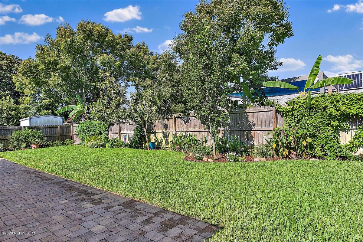 1870 Seminole Road Atlantic Beach, FL 32233 - Photo 23 of 27 a view of a house with a yard and potted plants