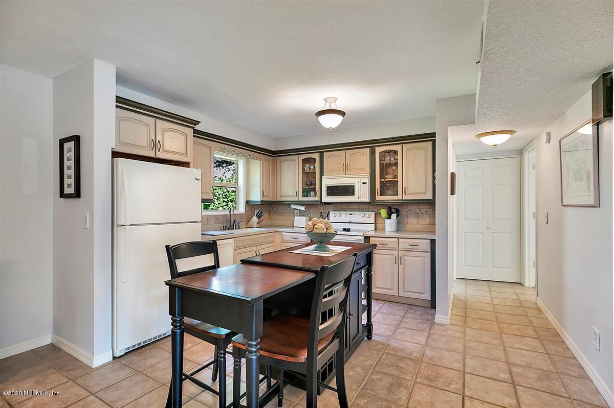 1870 Seminole Road Atlantic Beach, FL 32233 - Photo 7 of 27 a kitchen with a table and chairs