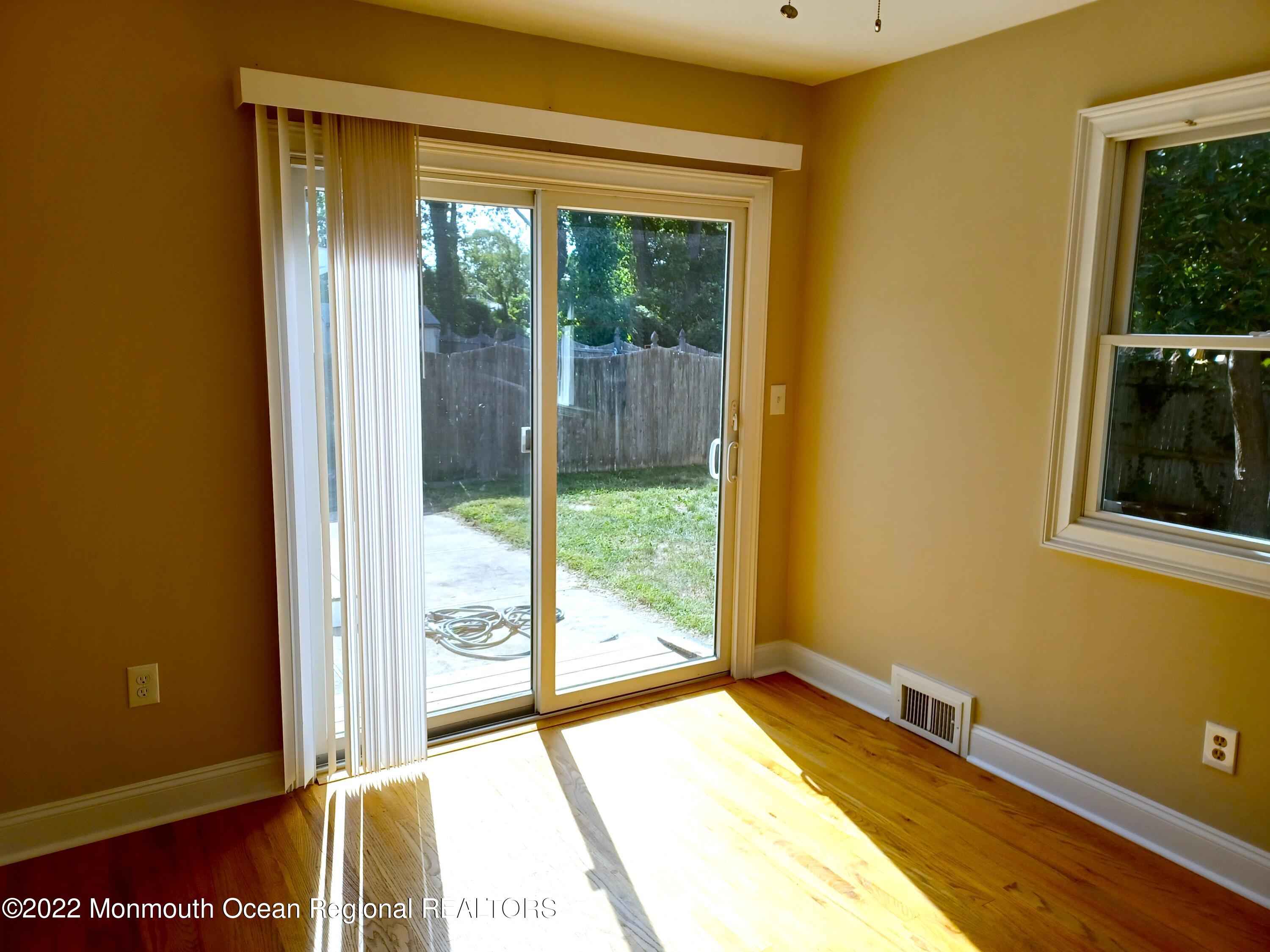 1301 Charles Street Point Pleasant, NJ 08742 - Photo 13 of 24 a view of an empty room with a window