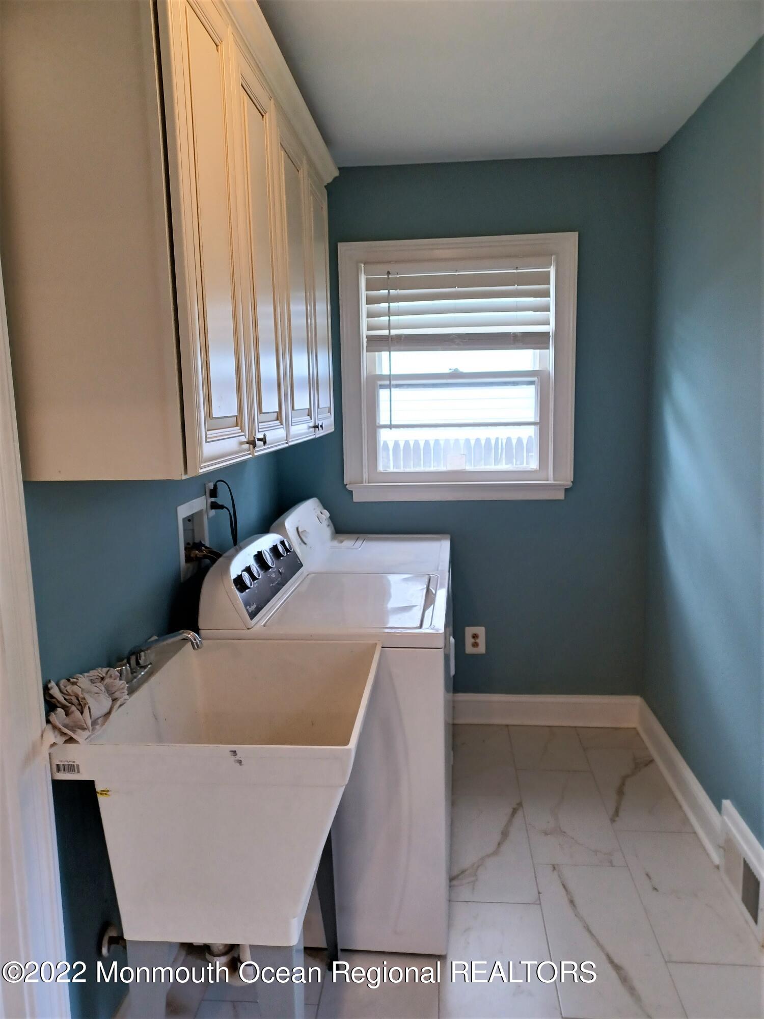 1301 Charles Street Point Pleasant, NJ 08742 - Photo 19 of 24 a room with a washing machine