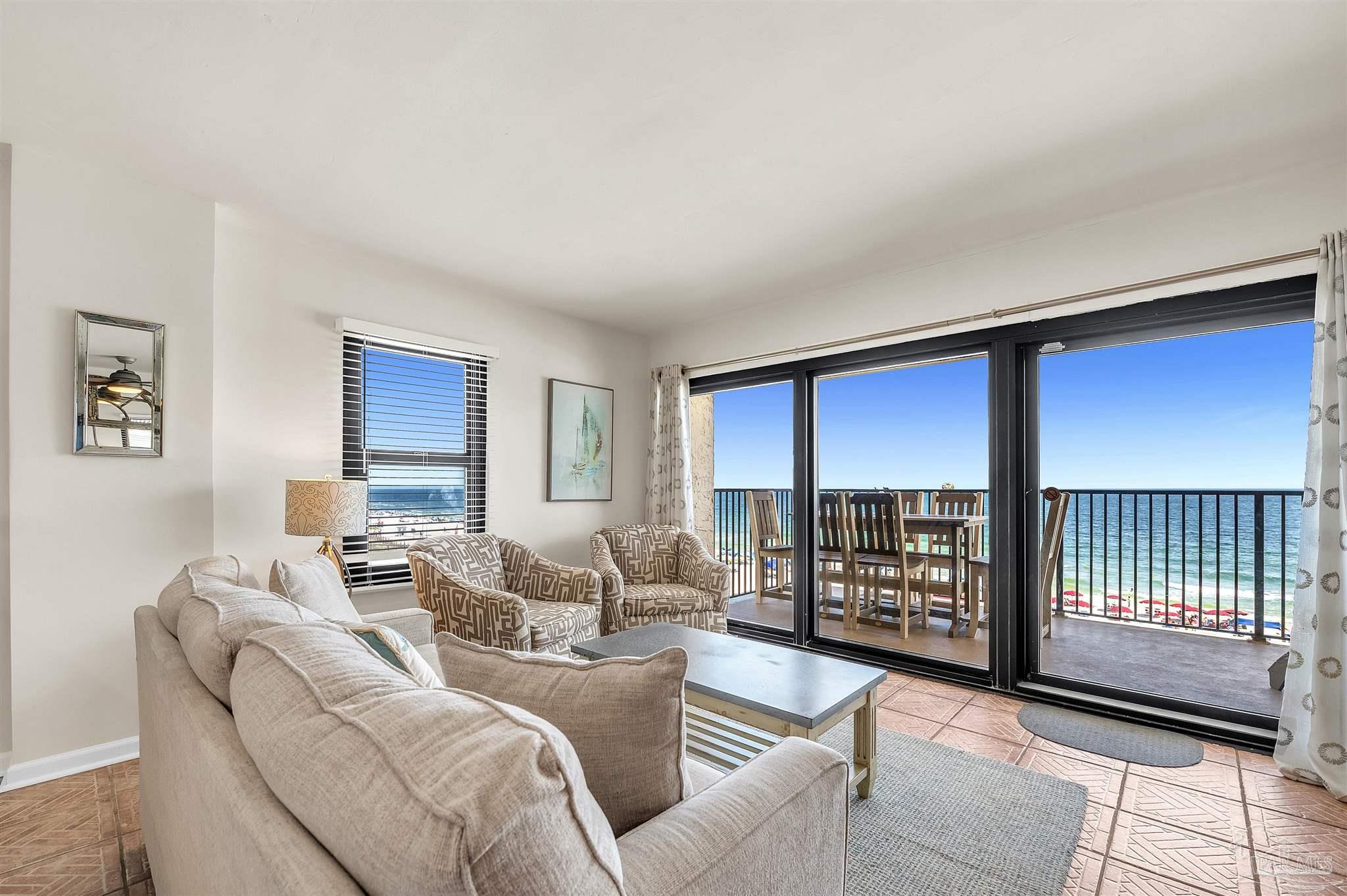 13817 Perdido Key Drive, Unit 501 Pensacola, FL 32507 - Photo 19 of 63 a living room with furniture and a window