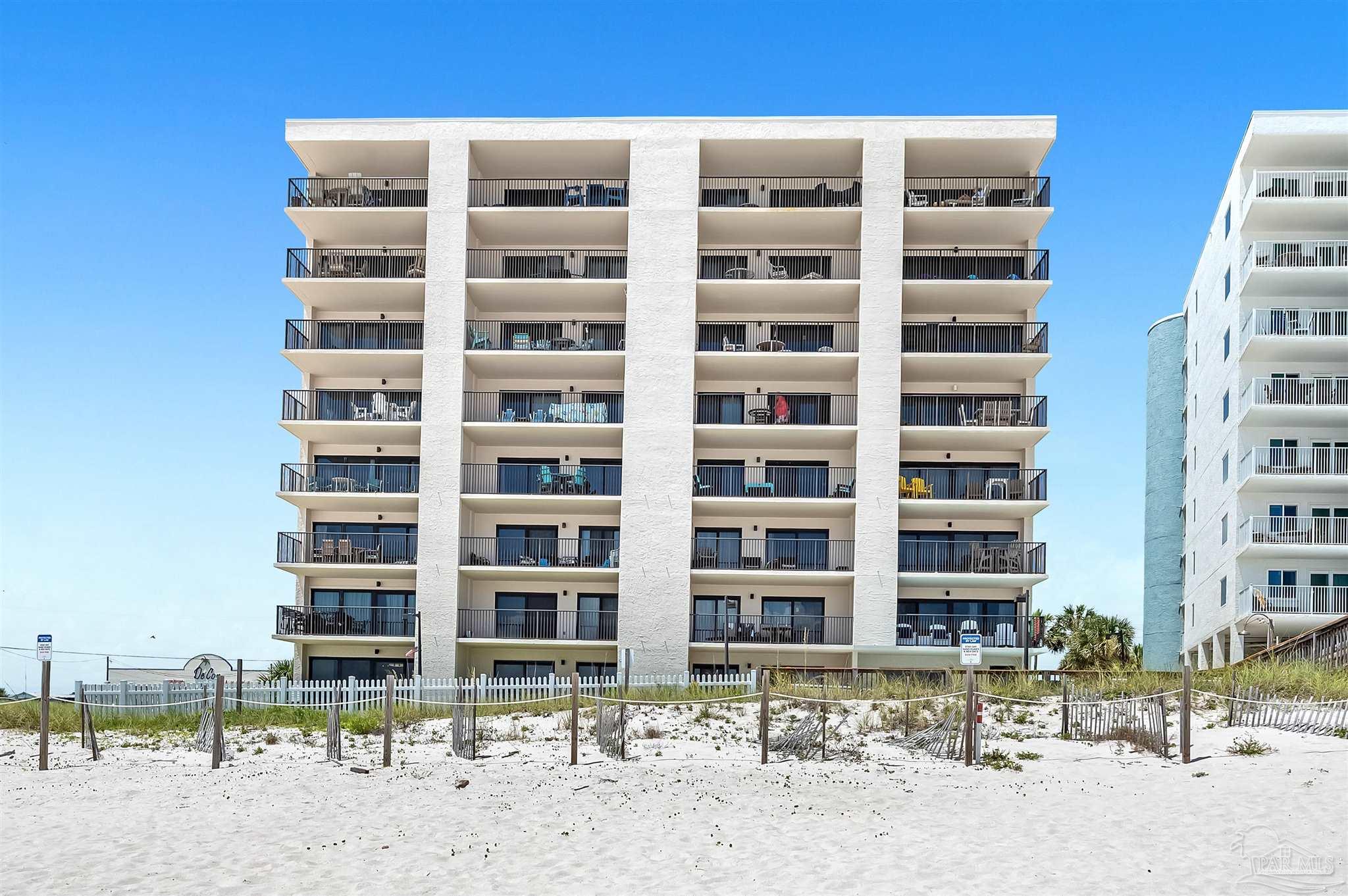 13817 Perdido Key Drive, Unit 501 Pensacola, FL 32507 - Photo 2 of 63 a front view of a building with street view