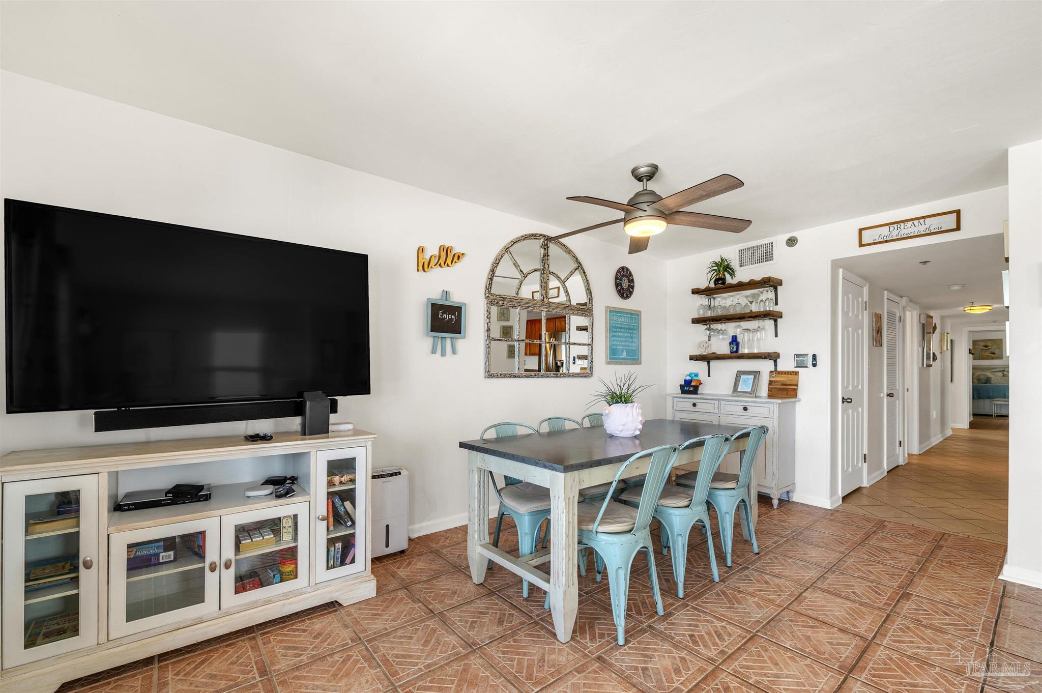 13817 Perdido Key Drive, Unit 501 Pensacola, FL 32507 - Photo 27 of 63 a view of a livingroom with furniture and a flat screen tv