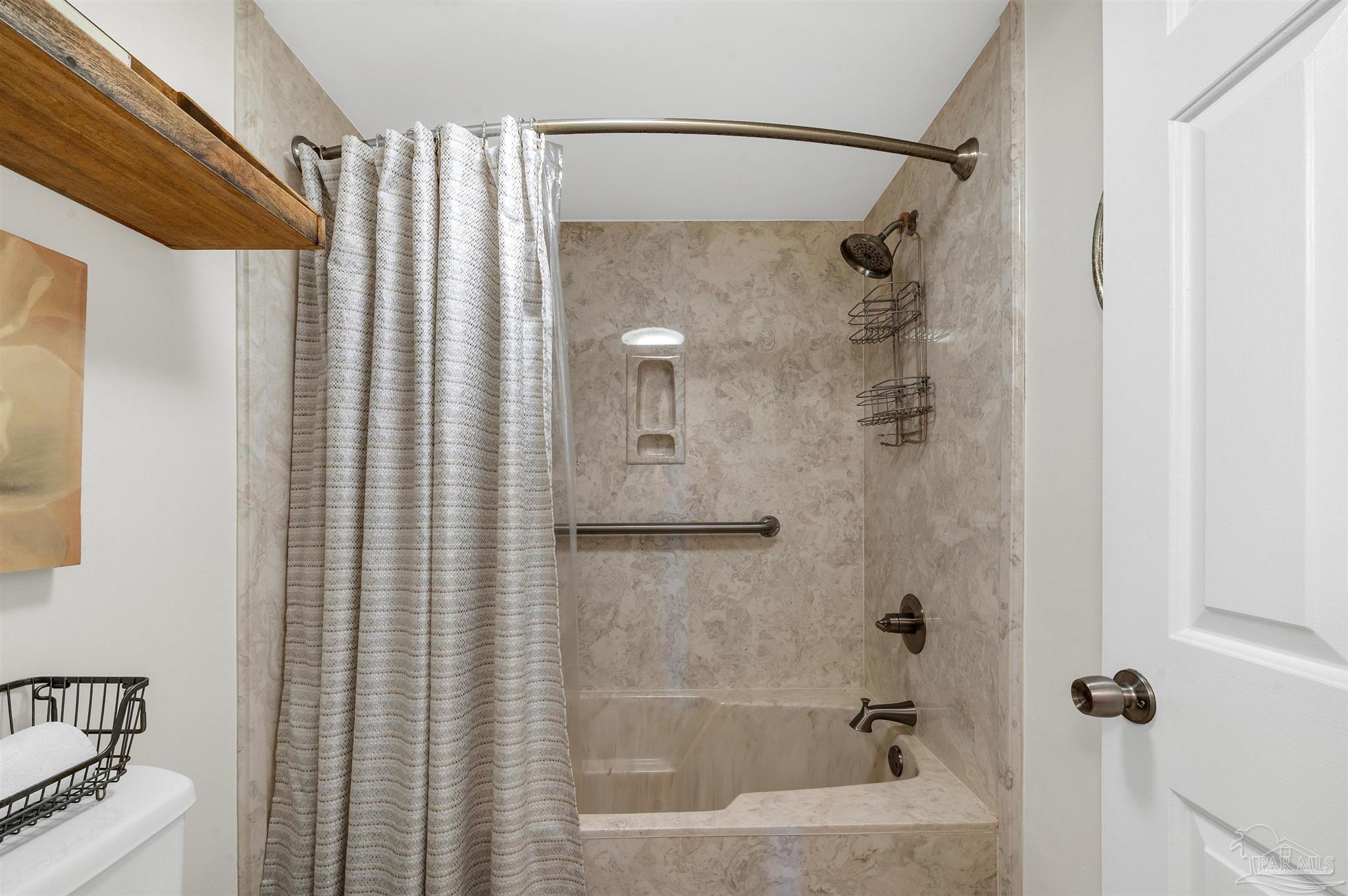 13817 Perdido Key Drive, Unit 501 Pensacola, FL 32507 - Photo 48 of 63 a bathroom with a shower and a tub