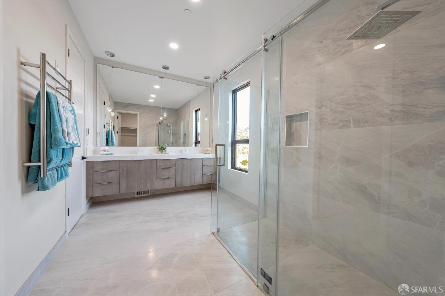 2011 Bishop Road Belmont, CA 94002 - Photo 13 of 35 a bathroom with a double vanity sink a large mirror and shower