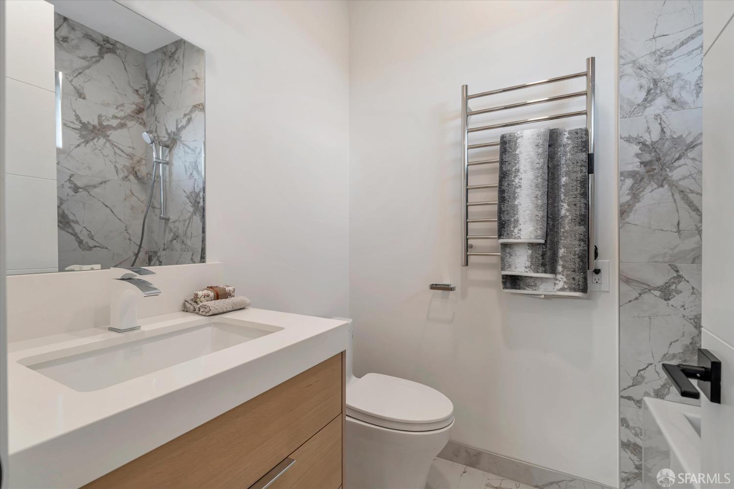 2011 Bishop Road Belmont, CA 94002 - Photo 15 of 35 a bathroom with a sink toilet and vanity