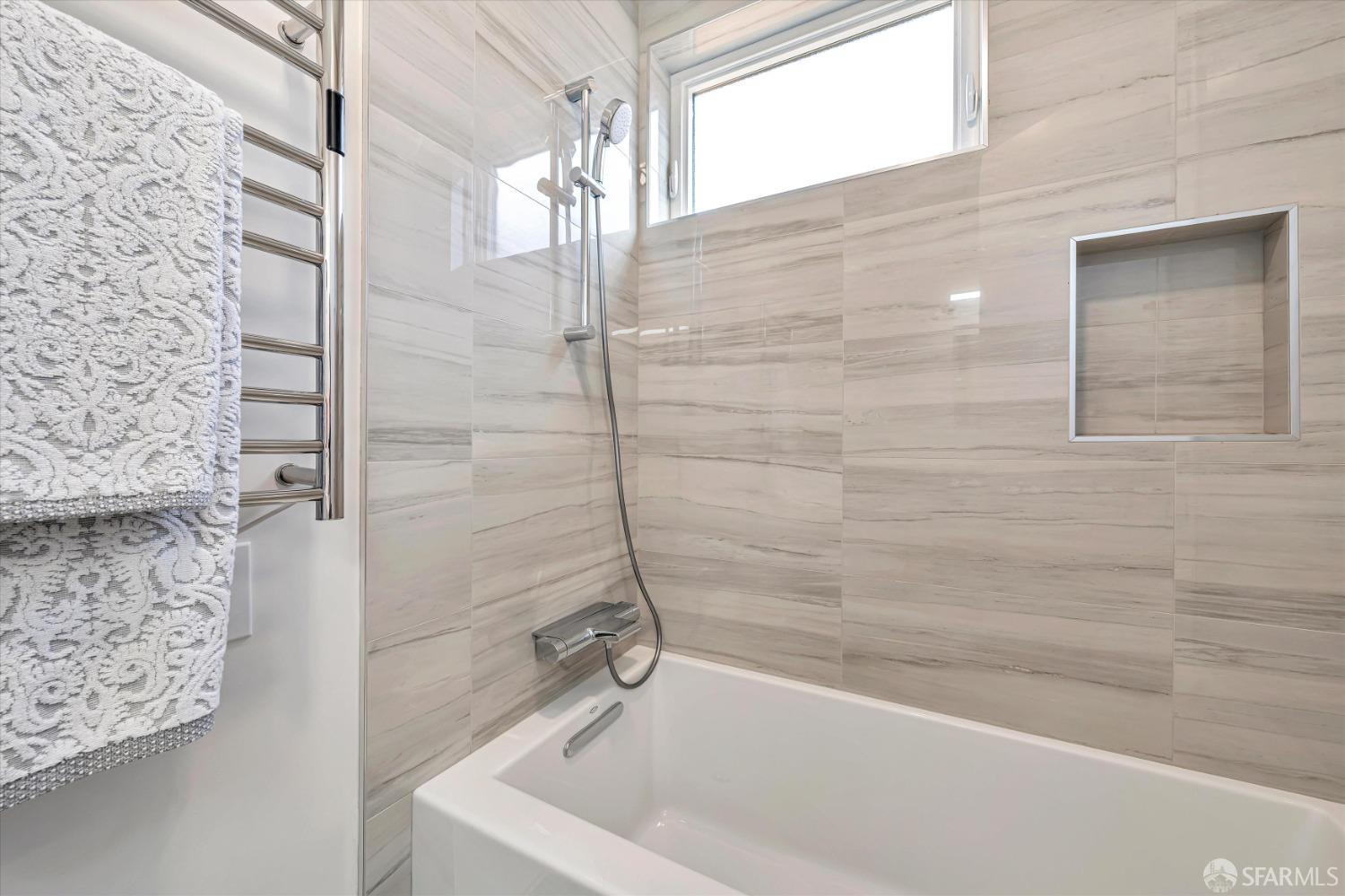 2011 Bishop Road Belmont, CA 94002 - Photo 24 of 35 a bathroom with a bathtub and shower