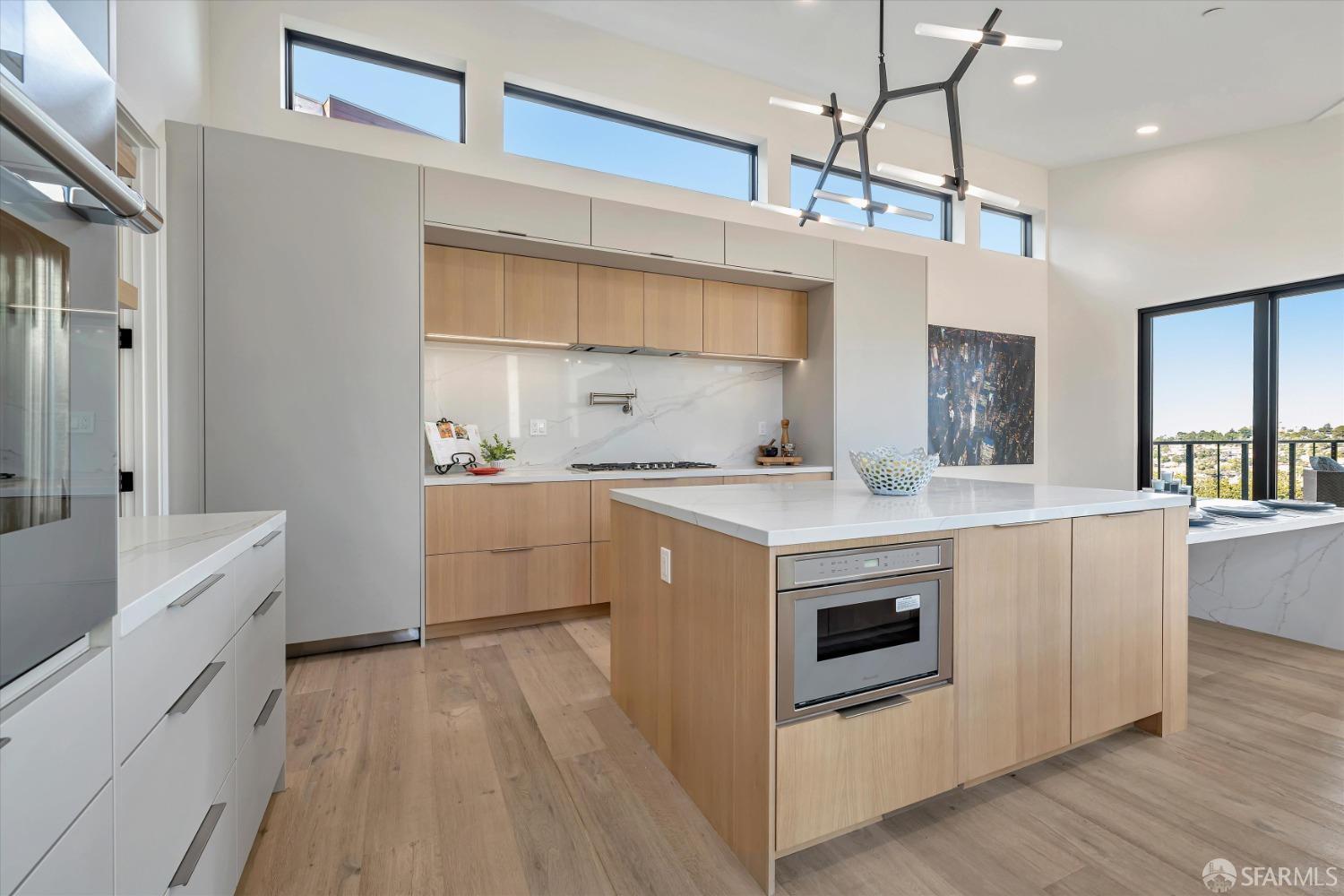 2011 Bishop Road Belmont, CA 94002 - Photo 7 of 35 a kitchen with a stove a sink and a refrigerator