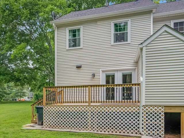 a view of a house with a roof deck