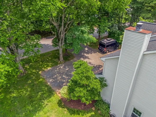 a backyard of a house with lots of green space