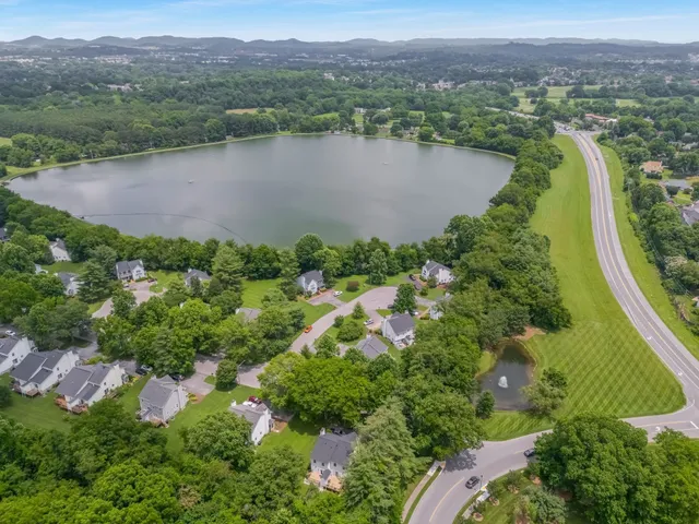 a view of a city with a lake