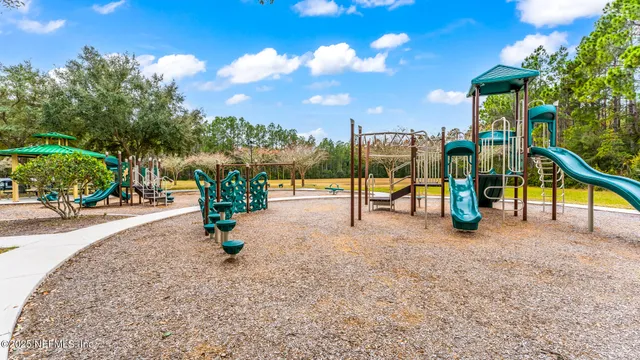 a view of a park with swings
