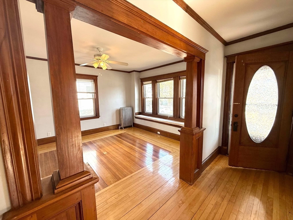 41 Woodward Avenue, Unit 2 Quincy, MA 02169 - Photo 20 of 27 a view of a room with wooden floor and windows