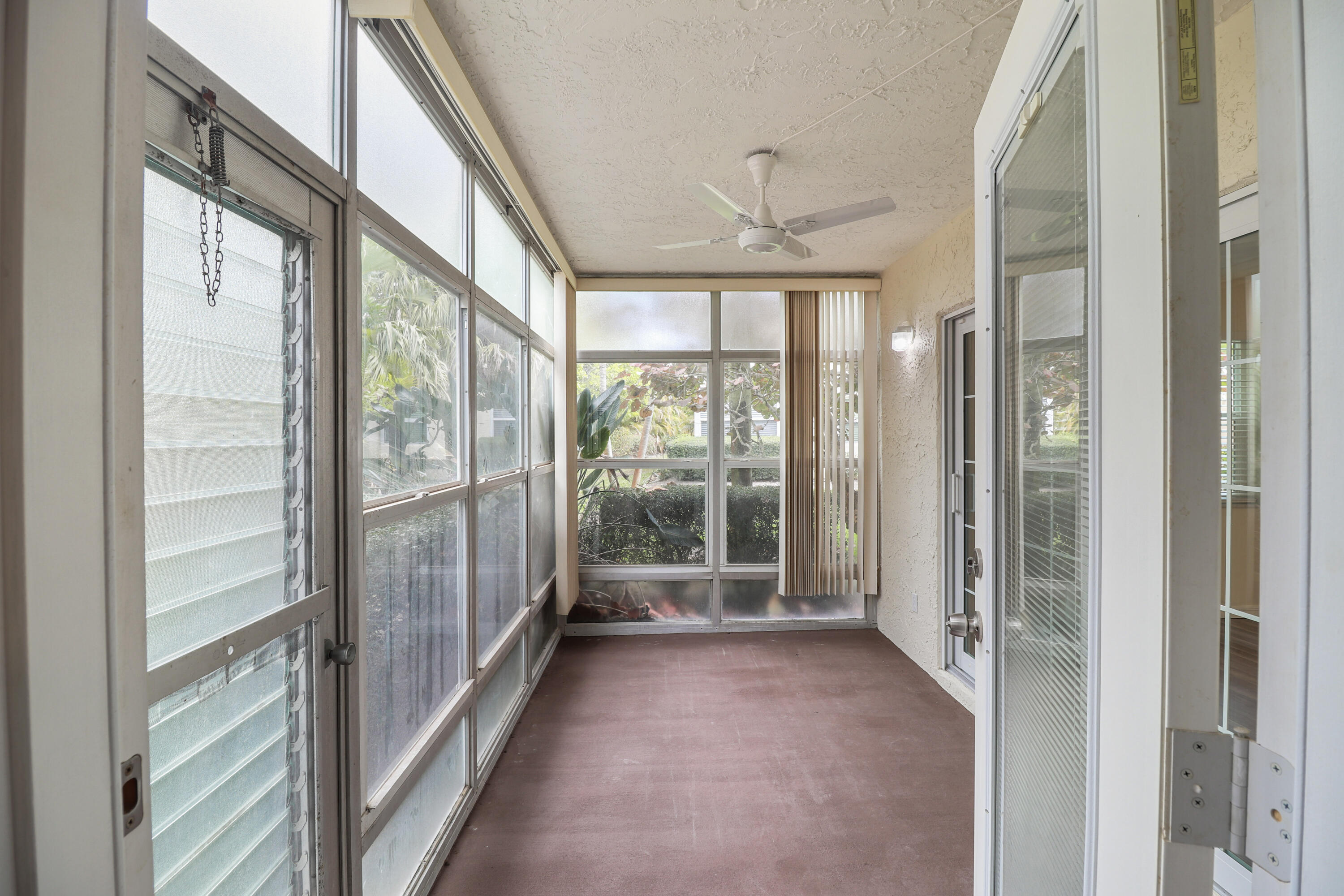 2950 Southeast Ocean Boulevard, Unit 1304 Stuart, FL 34996 - Photo 28 of 35 a view of a glass door and the balcony