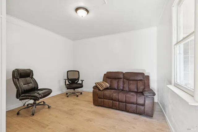 a bathroom with a sink a vanity and a mirror