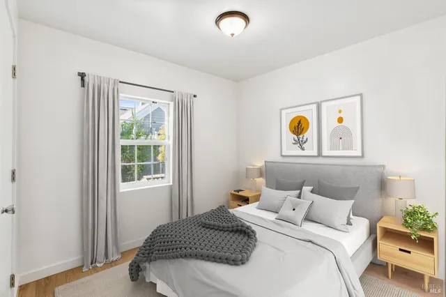 a living room with furniture and flat screen tv