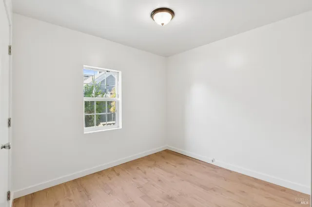 a room with furniture and a mirror