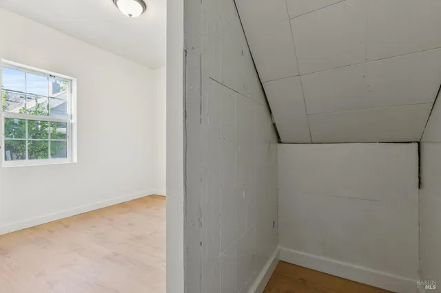 a workspace with furniture and wooden floor