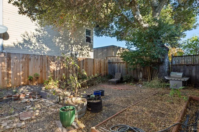 a bathroom with a toilet a sink and a window