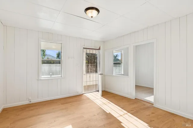 a view of an empty room with a window