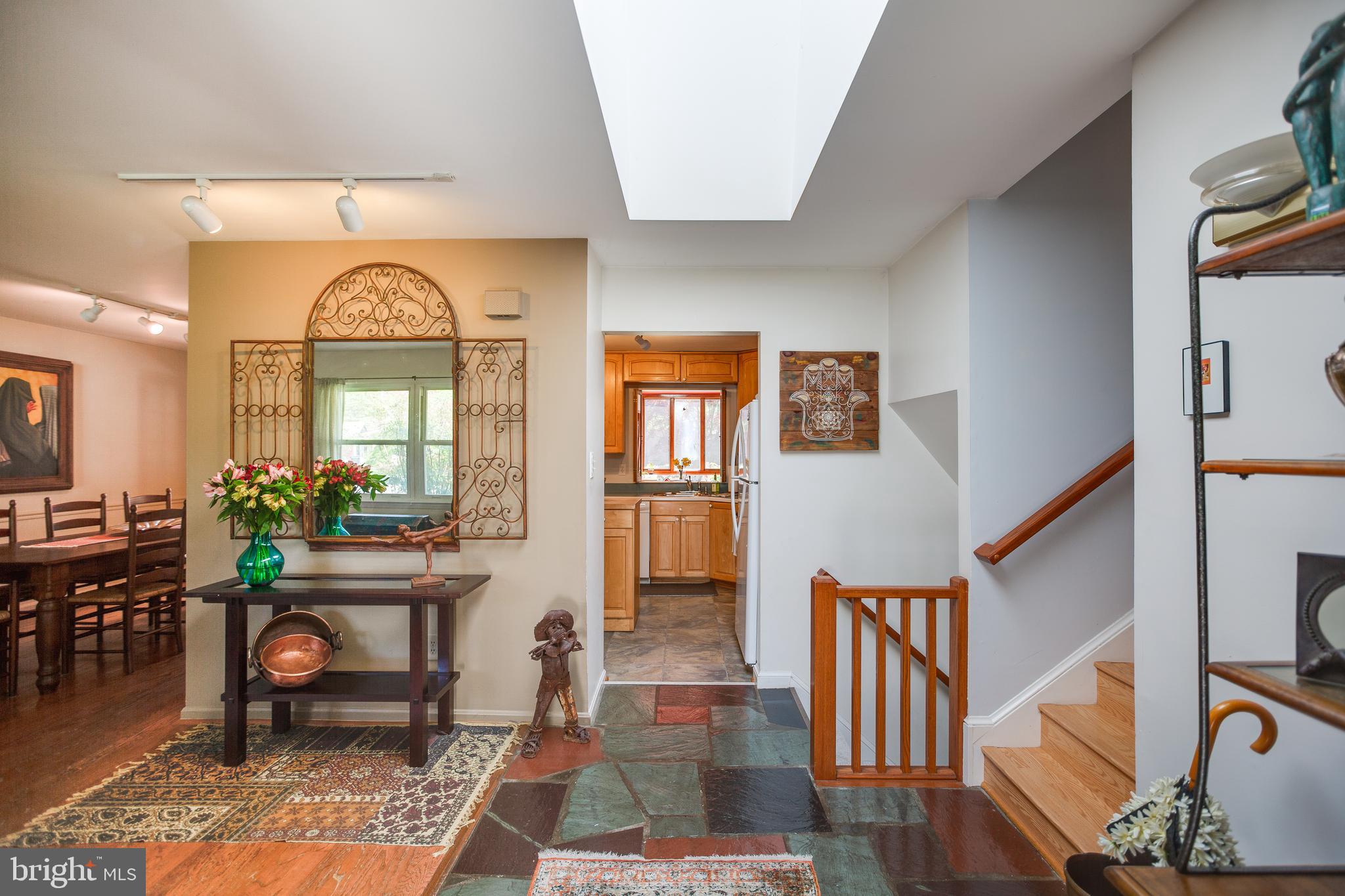 11340 Rambling Road Gaithersburg, MD 20879 - Photo 4 of 42 Inviting entry foyer with skylight
