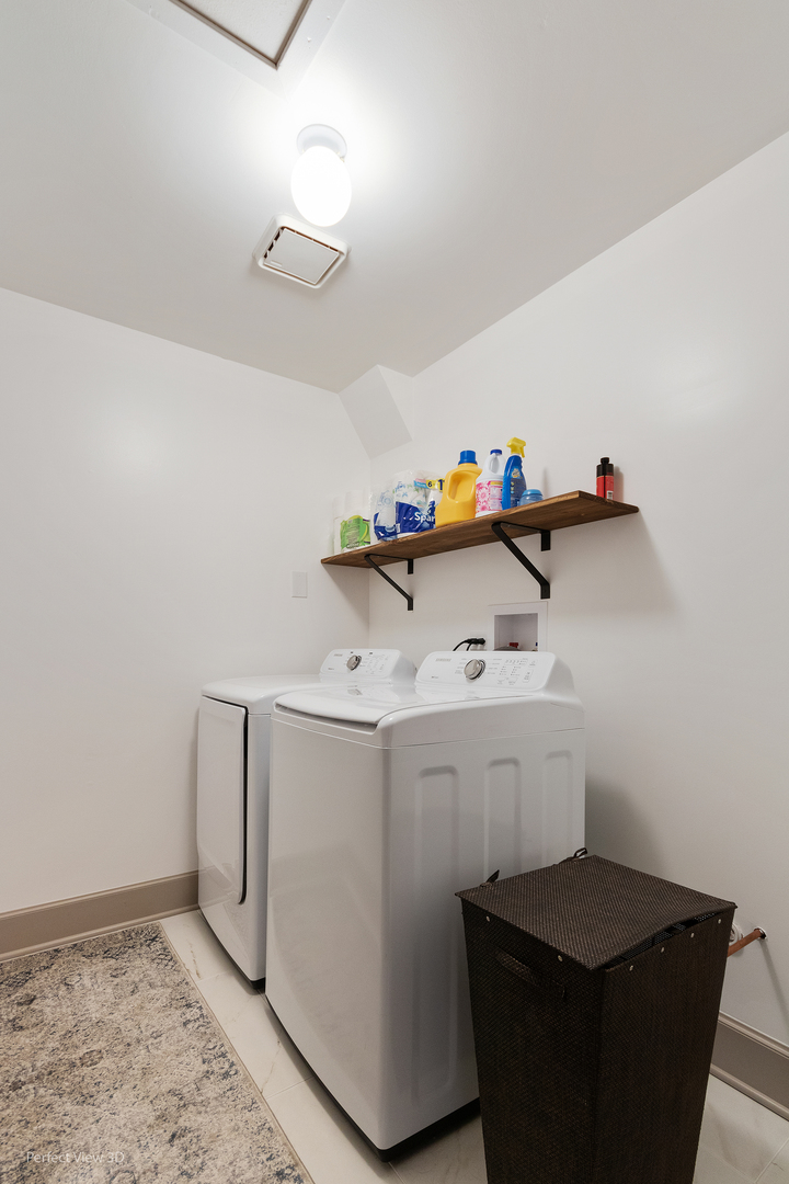 802 Meadow Ridge Lane, Unit 104 New Lenox, IL 60451 - Photo 11 of 15 a utility room with dryer and washer
