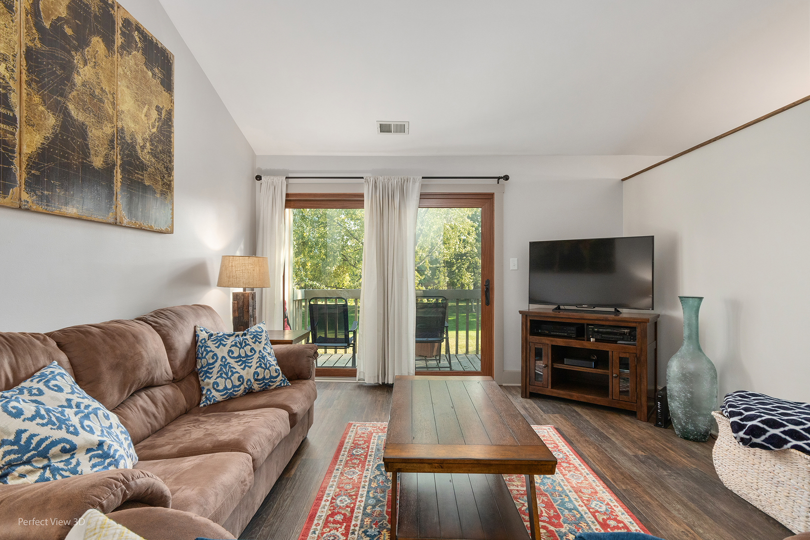 802 Meadow Ridge Lane, Unit 104 New Lenox, IL 60451 - Photo 3 of 15 a living room with furniture and a flat screen tv