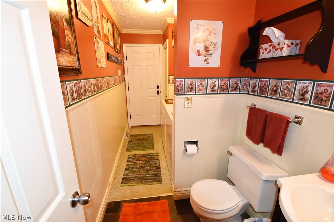 600 Yager Road Clinton, OH 44216 - Photo 11 of 33 1/2 bath and laundry on first floor.