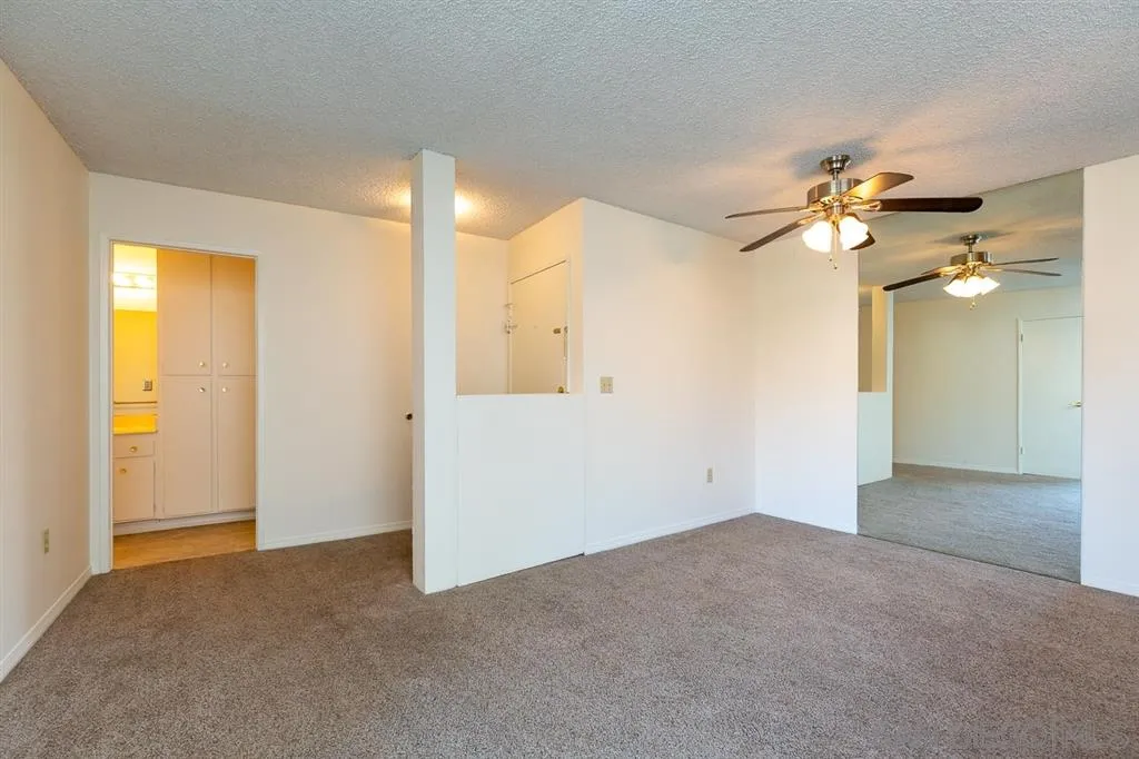 6780 Friars Road, Unit 257 San Diego, CA 92108 - Photo 6 of 20 a view of an empty room with a ceiling fan