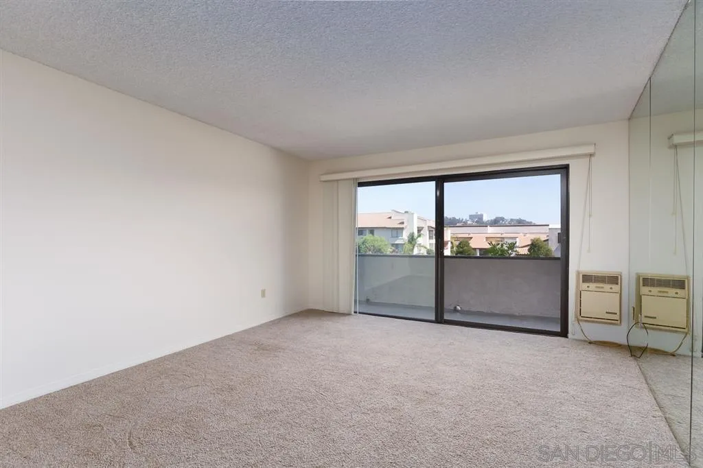 6780 Friars Road, Unit 257 San Diego, CA 92108 - Photo 7 of 20 a view of an empty room with a window