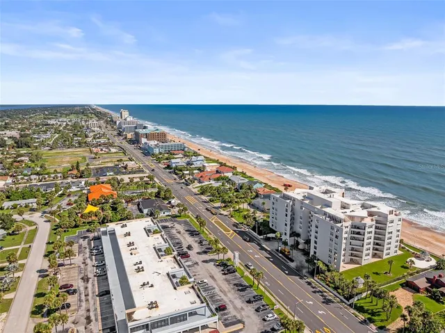 a view of city with ocean