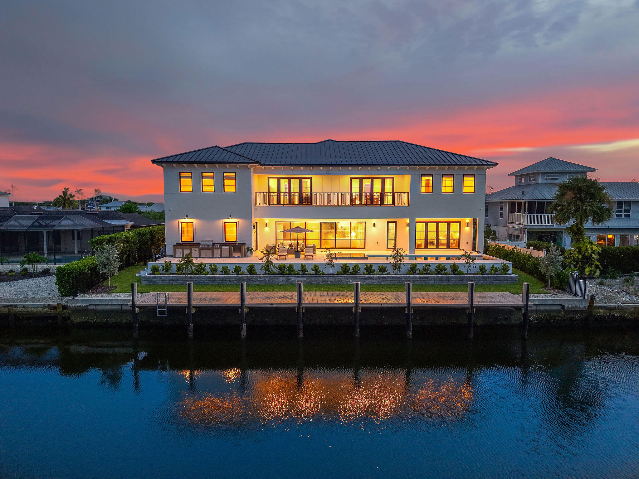 839 Chestnut Court Marco Island, FL 34145 - Photo 69 of 88 Night canal view of Marco Island home