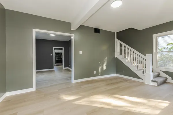 a view of an empty room and window