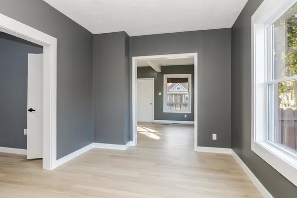 a kitchen with stainless steel appliances granite countertop a refrigerator stove and sink