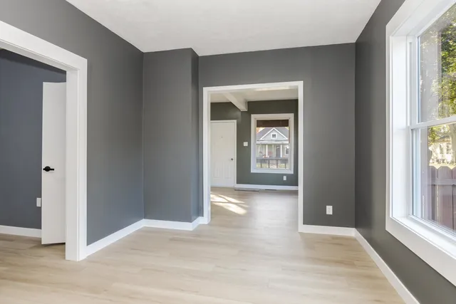 a kitchen with stainless steel appliances granite countertop a refrigerator stove and sink