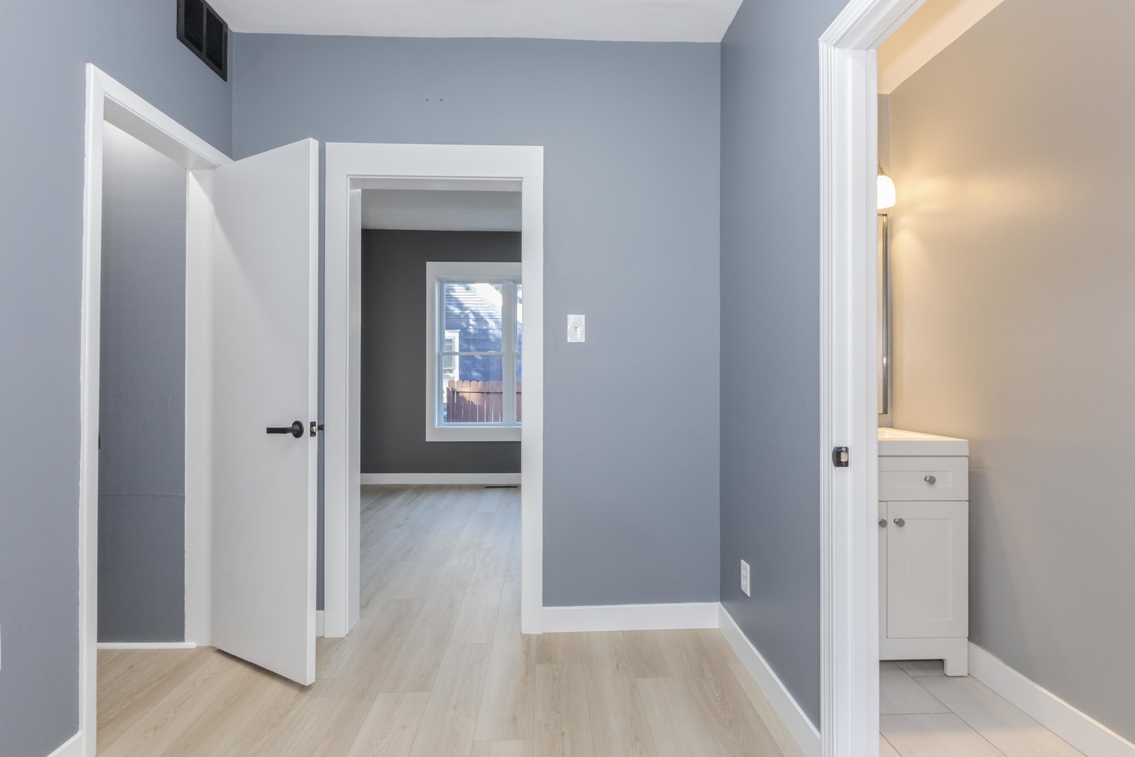 417 East Timber Street Pontiac, IL 61764 - Photo 25 of 43 a view of a hallway with wooden floor and closet