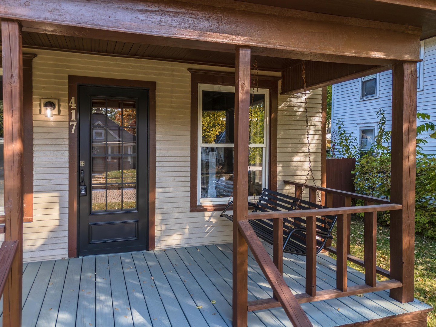 417 East Timber Street Pontiac, IL 61764 - Photo 6 of 43 a view of a deck with wooden floor and floor to ceiling window