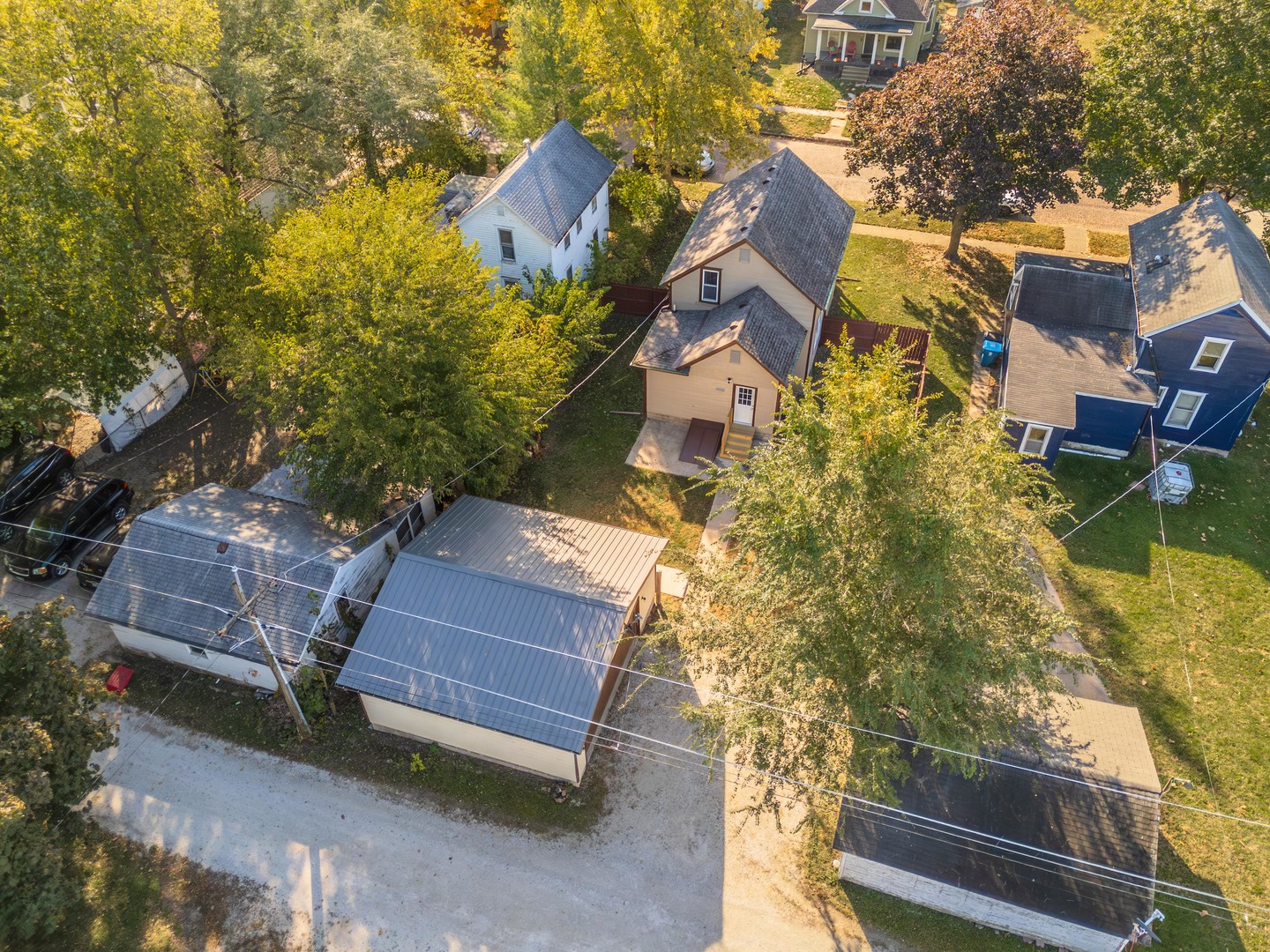 417 East Timber Street Pontiac, IL 61764 - Photo 9 of 43 an aerial view of a house with a yard and wooden fence