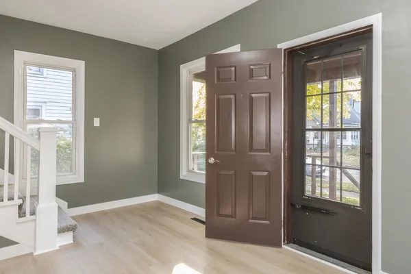a view of an empty room with a window