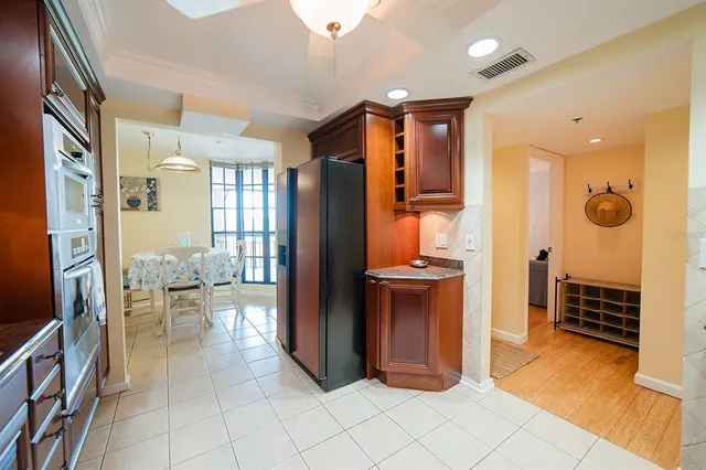 a view of a balcony with furniture and wooden deck