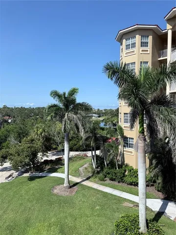 a spacious bathroom with a sink double vanity and a mirror