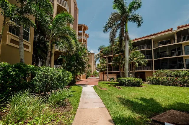 a view of a dining room with furniture and window