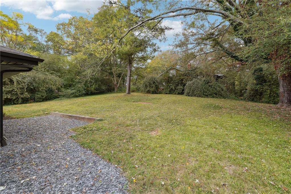 3644 Lakeside Court Tucker, GA 30084 - Photo 12 of 12 a view of a yard with a tree