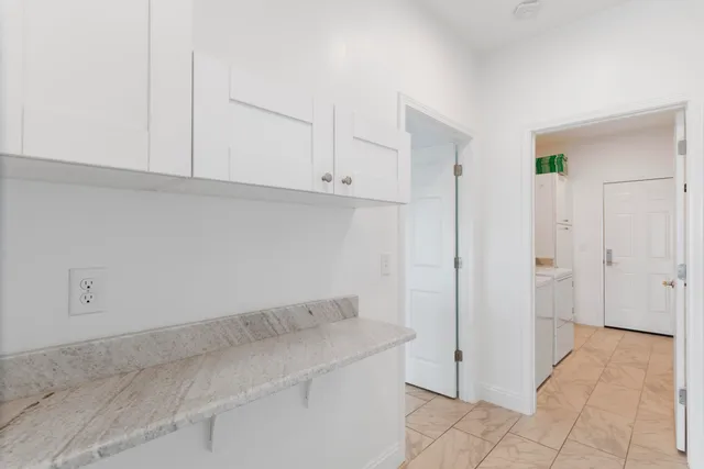 a view of an entryway with a glass door