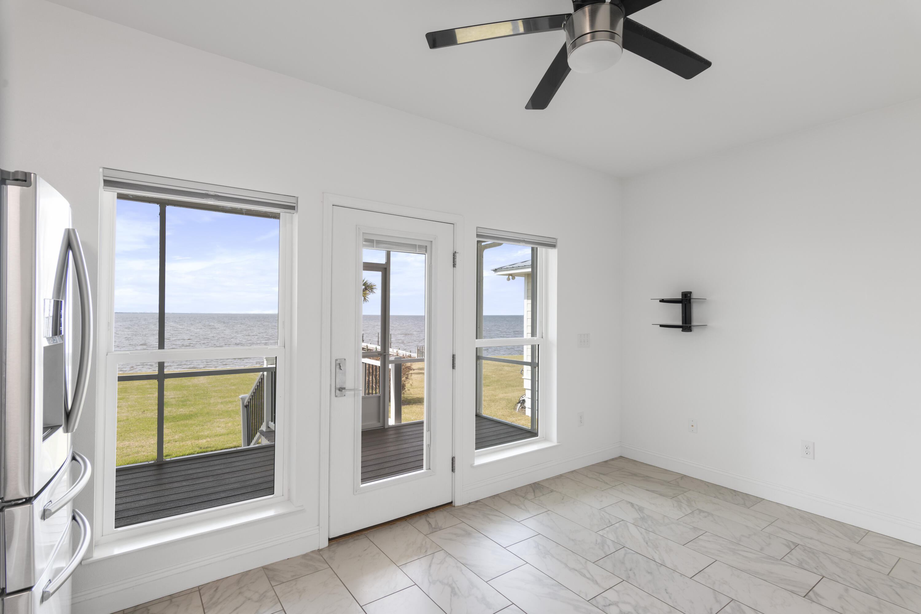 10 South Sunset Harbour Freeport, FL 32439 - Photo 28 of 57 a view of an entryway with a glass door