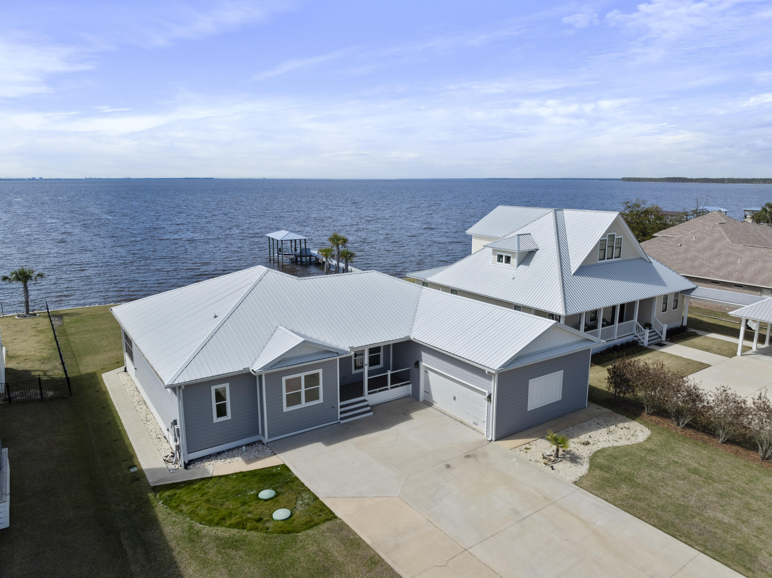 10 South Sunset Harbour Freeport, FL 32439 - Photo 3 of 57 an aerial view of a house with a big yard