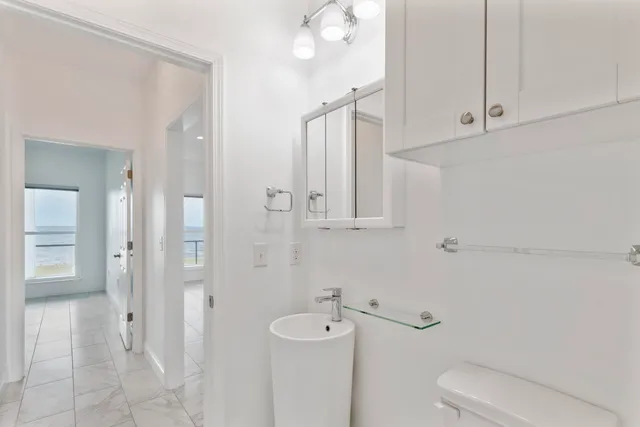 a view of a balcony with furniture