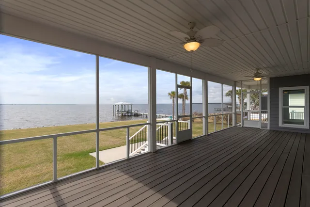 a front view of a house with a patio