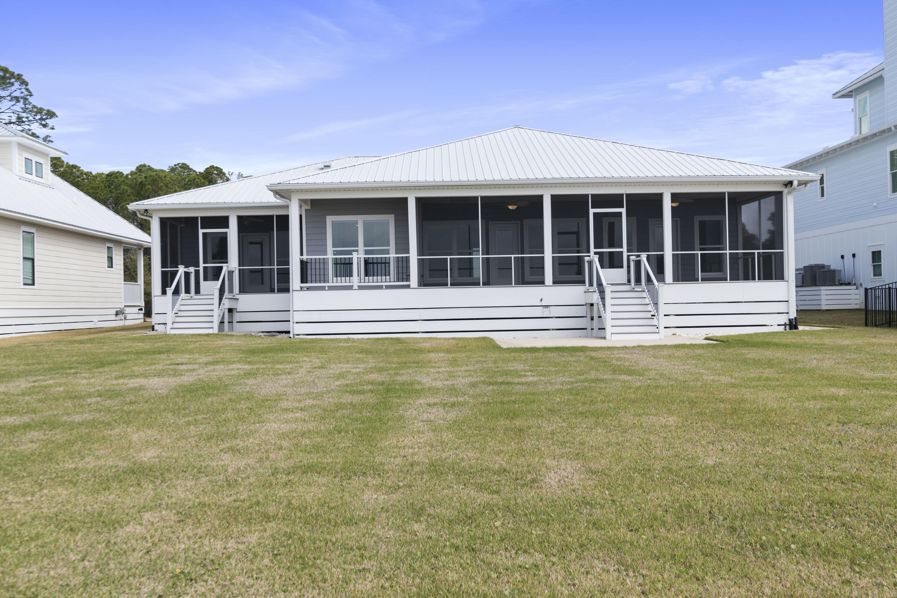 10 South Sunset Harbour Freeport, FL 32439 - Photo 47 of 57 a house view with swimming pool in front of it