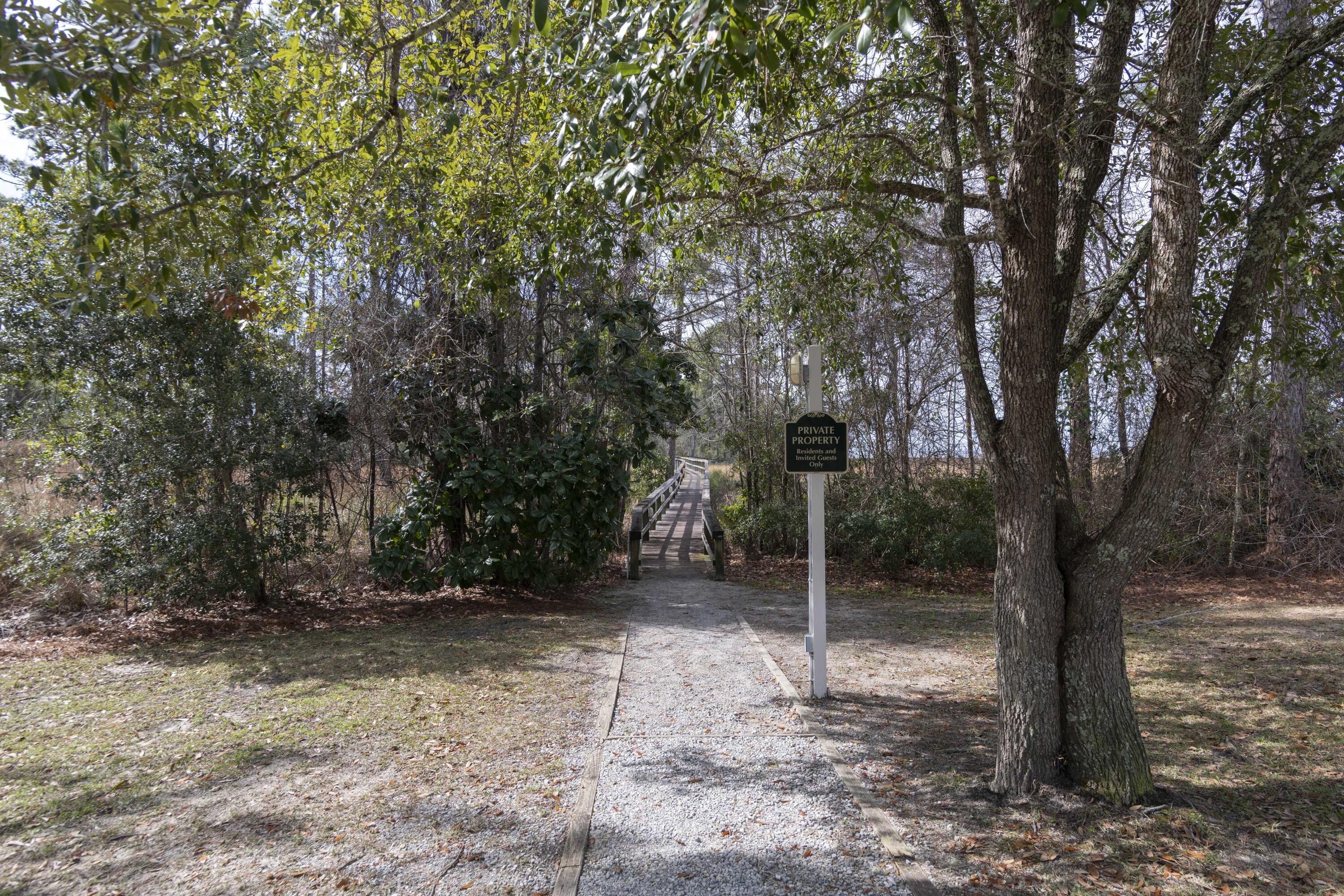10 South Sunset Harbour Freeport, FL 32439 - Photo 55 of 57 a backyard of a house with lots of trees
